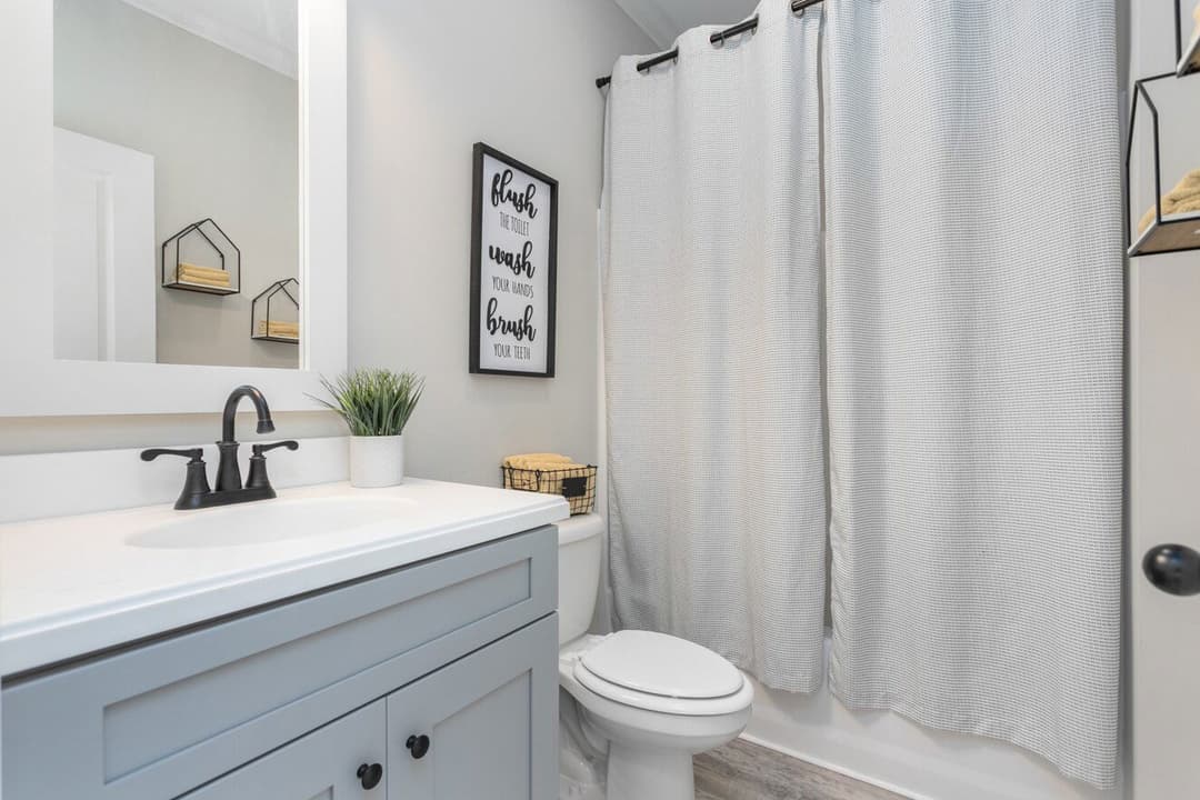 Farmhouse i two story bathroom home features