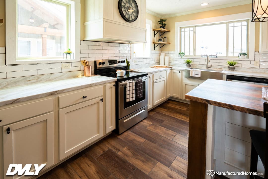 The adriel corner ½ rock fireplace kitchen home features