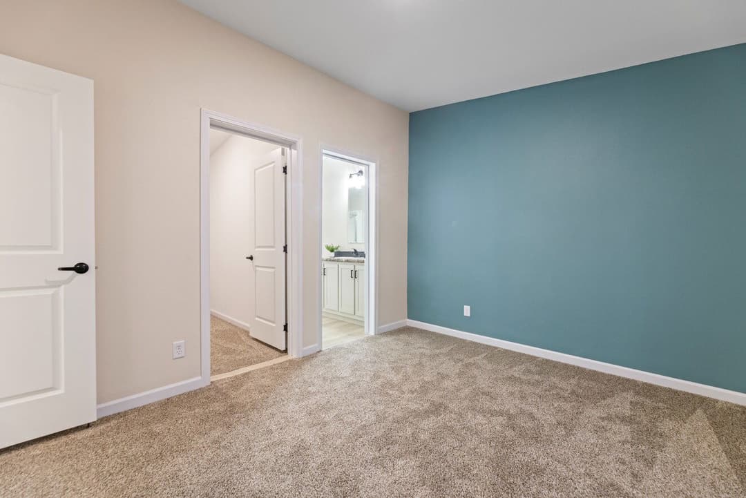 The timberlake with porch 193002 bedroom home features