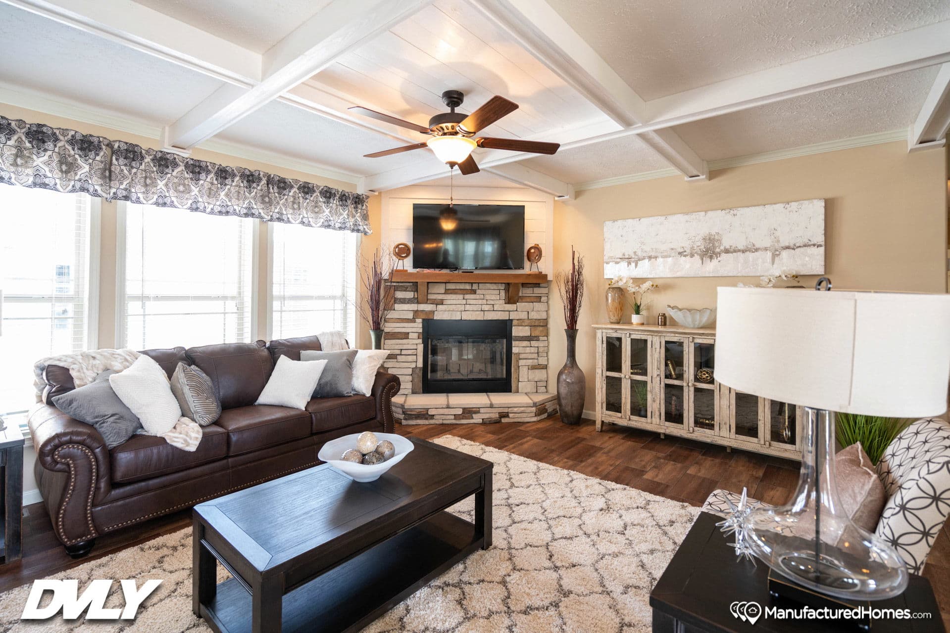 The adriel corner ½ rock fireplace interior home features