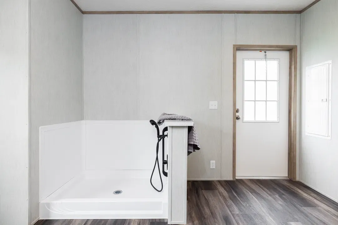 The dark sands bathroom home features